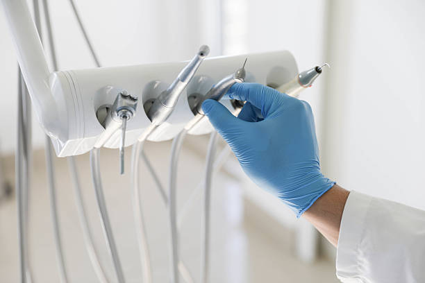 Professional Tooth Extraction technician working in Monrovia, IN